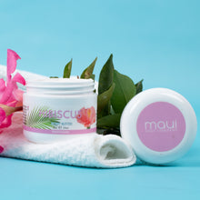 Load image into Gallery viewer, Two jars of Maui Soap Company product with pink flowers and green leaves on a blue background