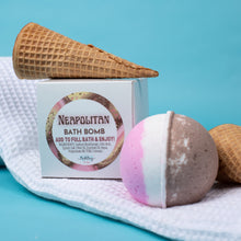 Load image into Gallery viewer, Neapolitan bath bomb with waffle cone and packaging on a blue background