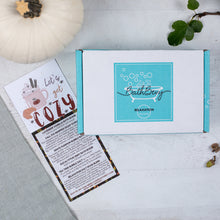 Load image into Gallery viewer, Bath product box with &#39;BathBevy&#39; branding on a light wooden surface.