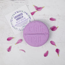 Load image into Gallery viewer, Purple bath bomb with &#39;Cultivator&#39; branding on a white surface with lavender petals.